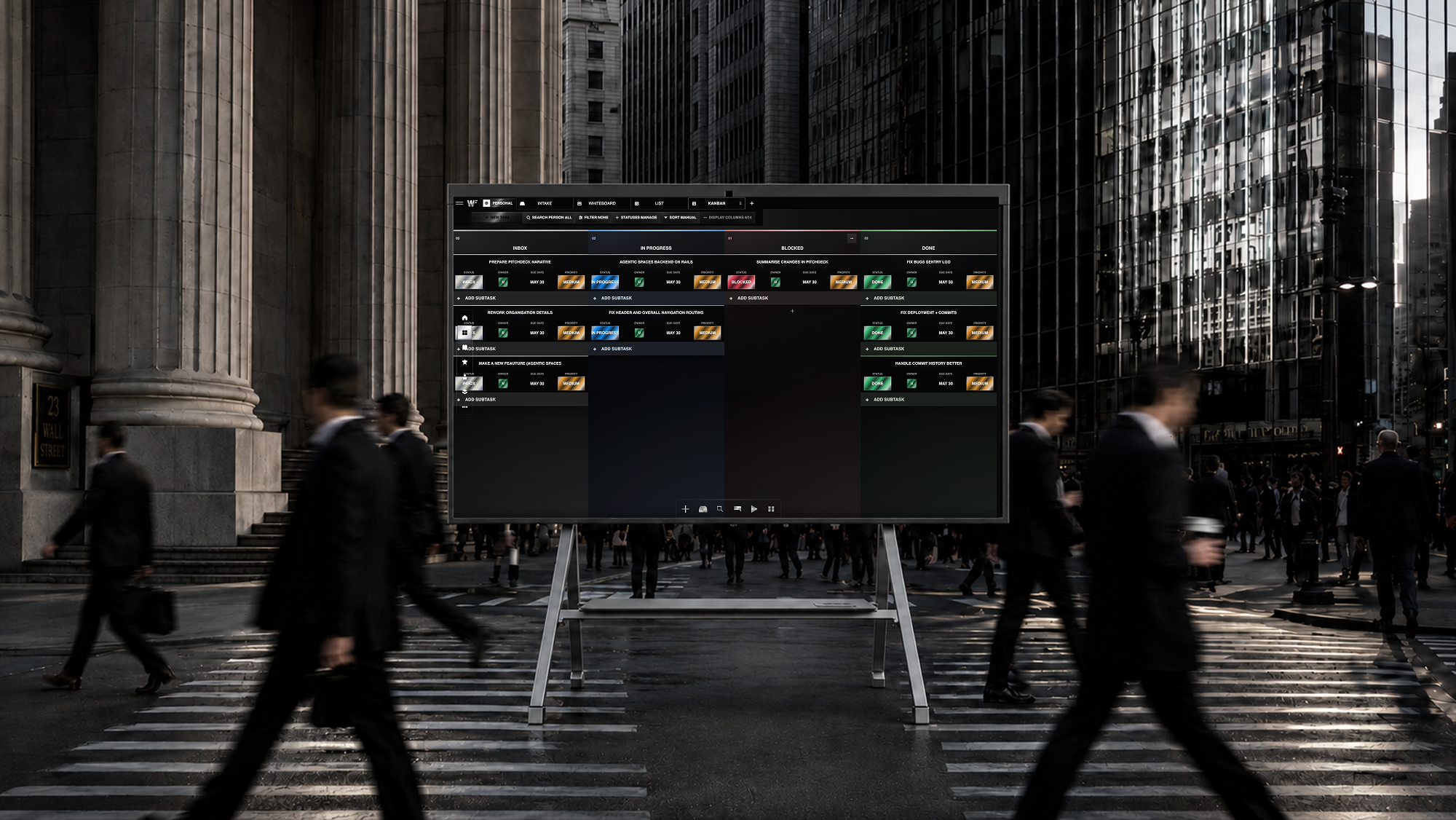 The Working 500 kanban view displayed on a freestanding screen